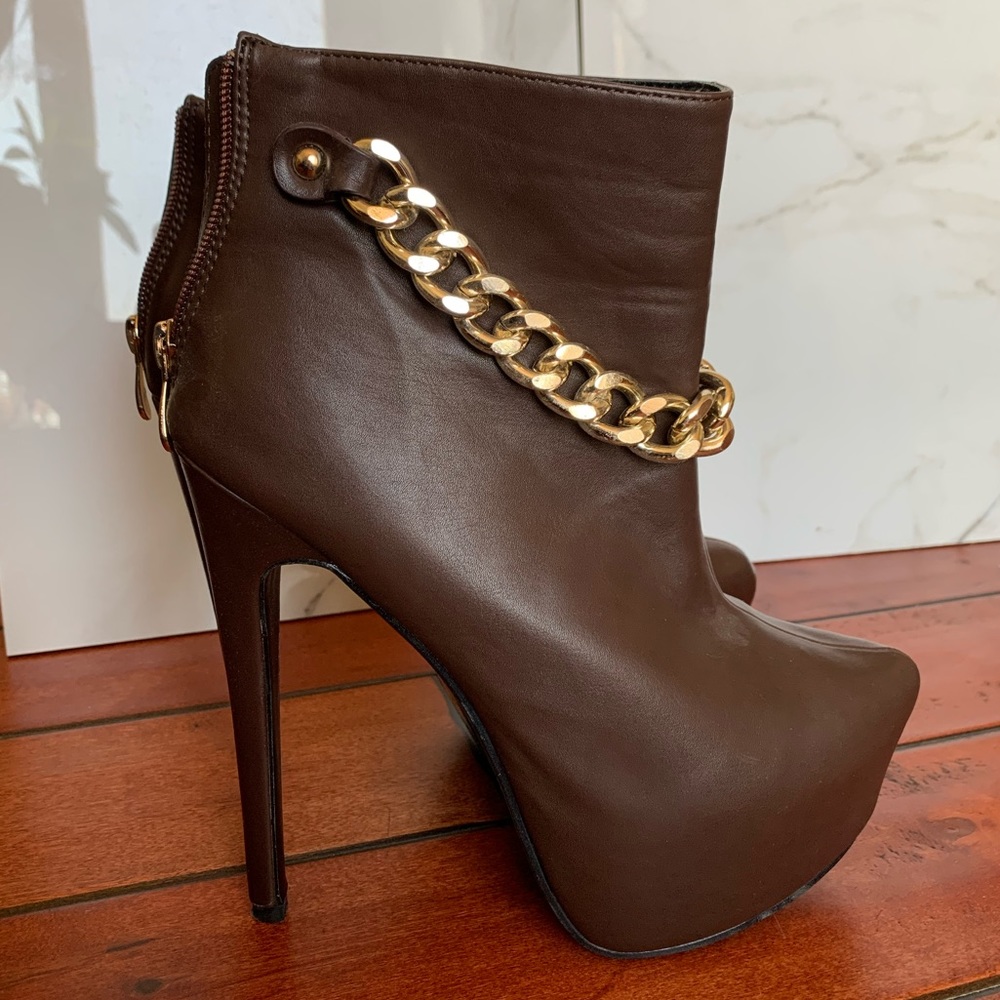 Brown heel boots with gold hardware